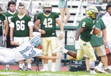 
			
				                                Wyoming Area’s Lidge Kellum (2) gets past Dallas’ Rowan Laubach (13) on his way to a 63-yard touchdown for the Warriors in Friday night’s WVC slugfest. Kellum topped 300 yards on the ground in Wyoming Area’s win.
                                 Tony Callaio | For Times Leader

			
		