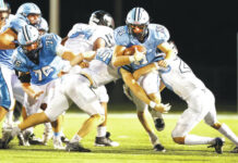 
			
				                                Dallas quarterback Brady Zapoticky carries the ball against Wilkes-Barre Area in the second quarter.
                                 Fred Adams | For Times Leader

			
		